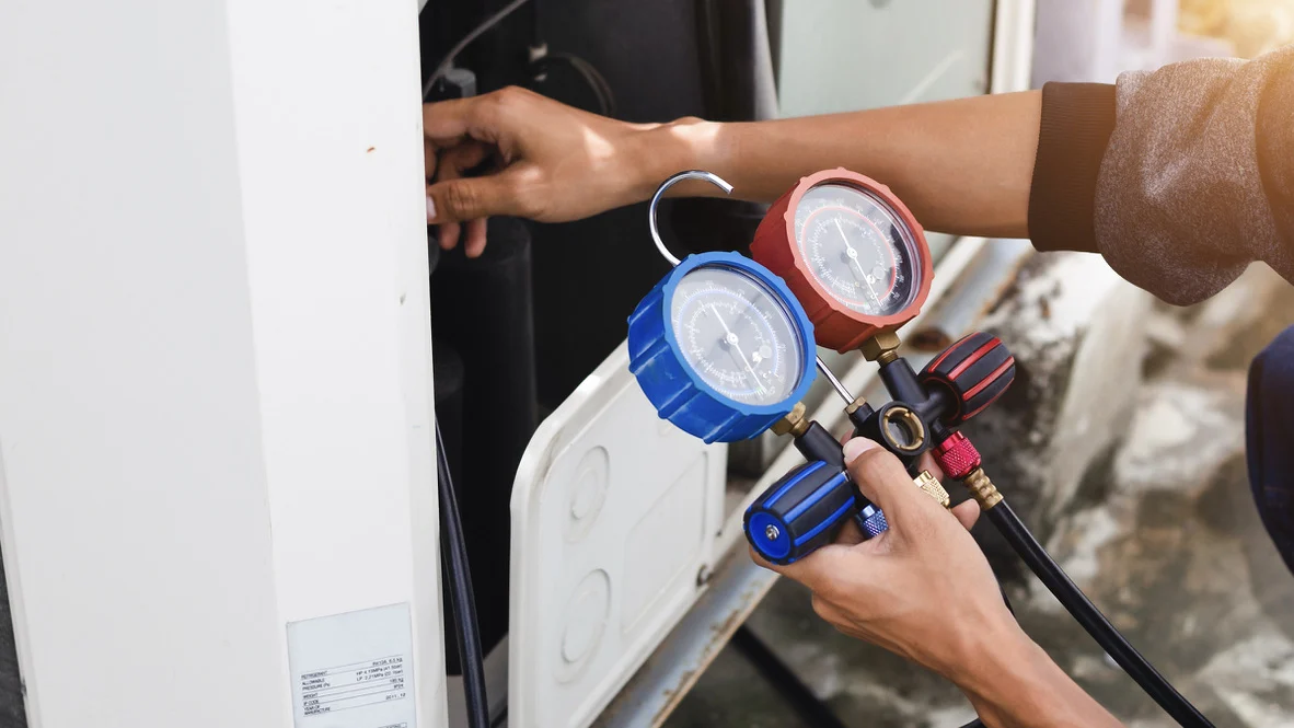 Heat Pump Maintenance - Ogden - Absolute Comfort AC technician performs heat pump tune-up for Ogden homeowner