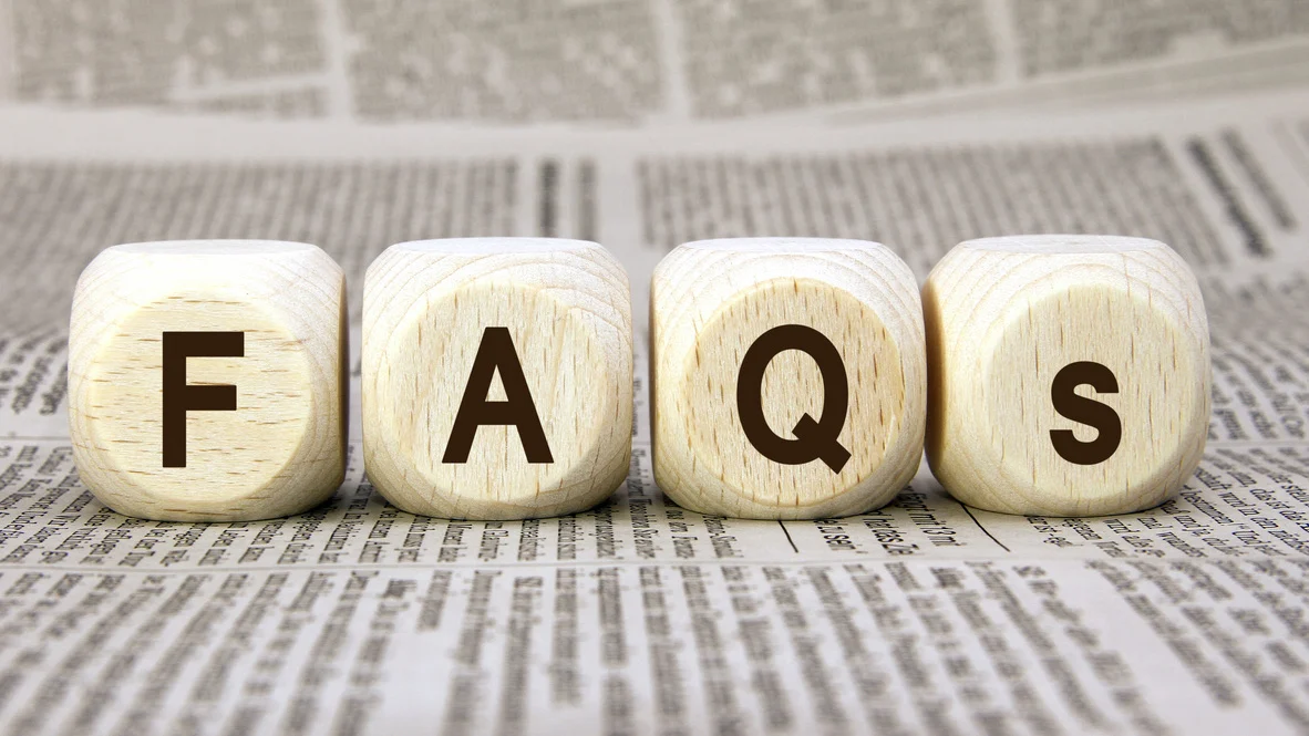 Heating FAQs – Ogden, UT – Absolute Comfort Dice with F, A, Q, s, on them on newsprint background