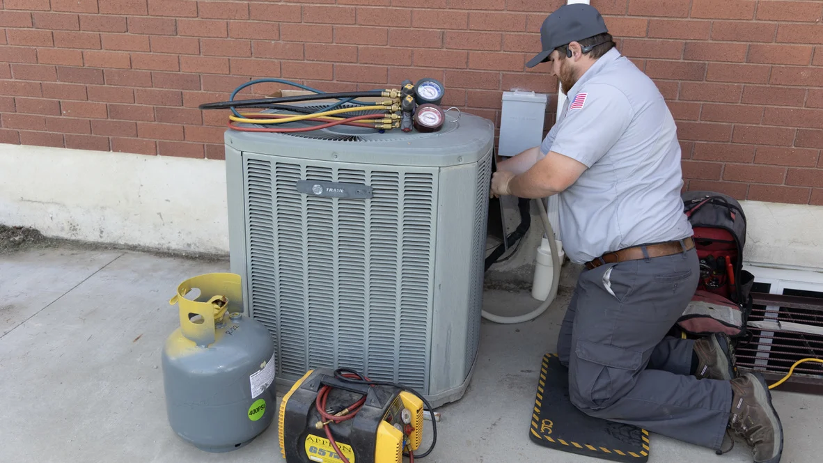 AC Repair Installation Maintenance Cooling Ogden Absolute Comfort Absolute Comfort technician does Ogden AC system tune-up