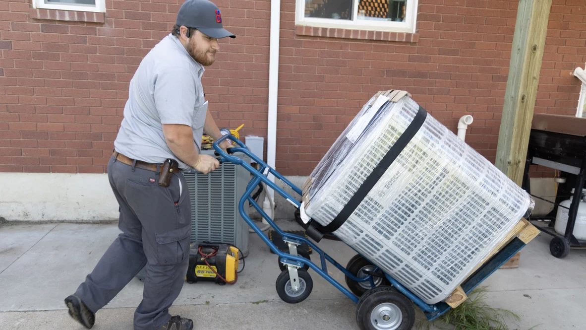 AC Services Air Conditioner Installation Repair Maintenance Ogden Absolute Comfort Absolute Comfort technicians deliver new AC system