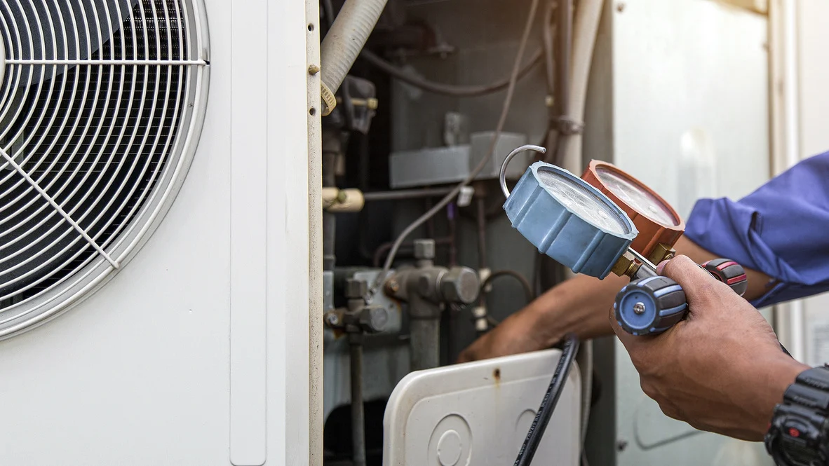 Absolute Comfort technician installs new heat pump system