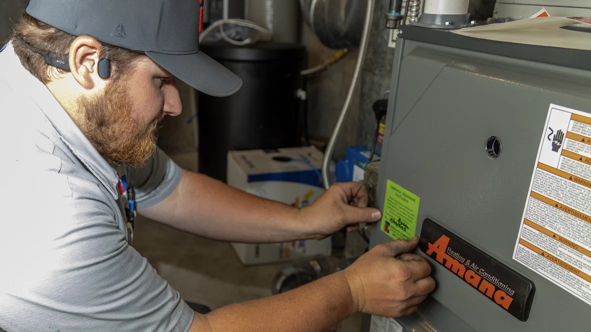 Heating Maintenance – Absolute Comfort – Ogden, Utah Absolute Comfort technician maintains Ogden furnace