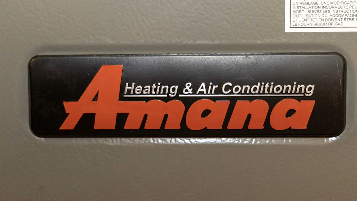 HVAC Warranty – Ogden, Utah – Absolute Comfort Close-up of Amana logo on Ogden furnace