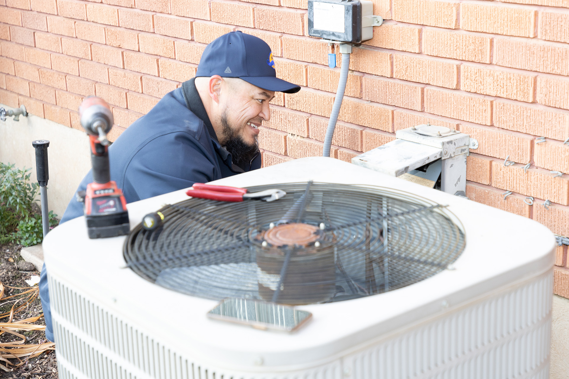 Air Conditioning Repair Cooling Service HVAC Ogden Absolute Comfort Absolute Comfort technician does Ogden AC system repair