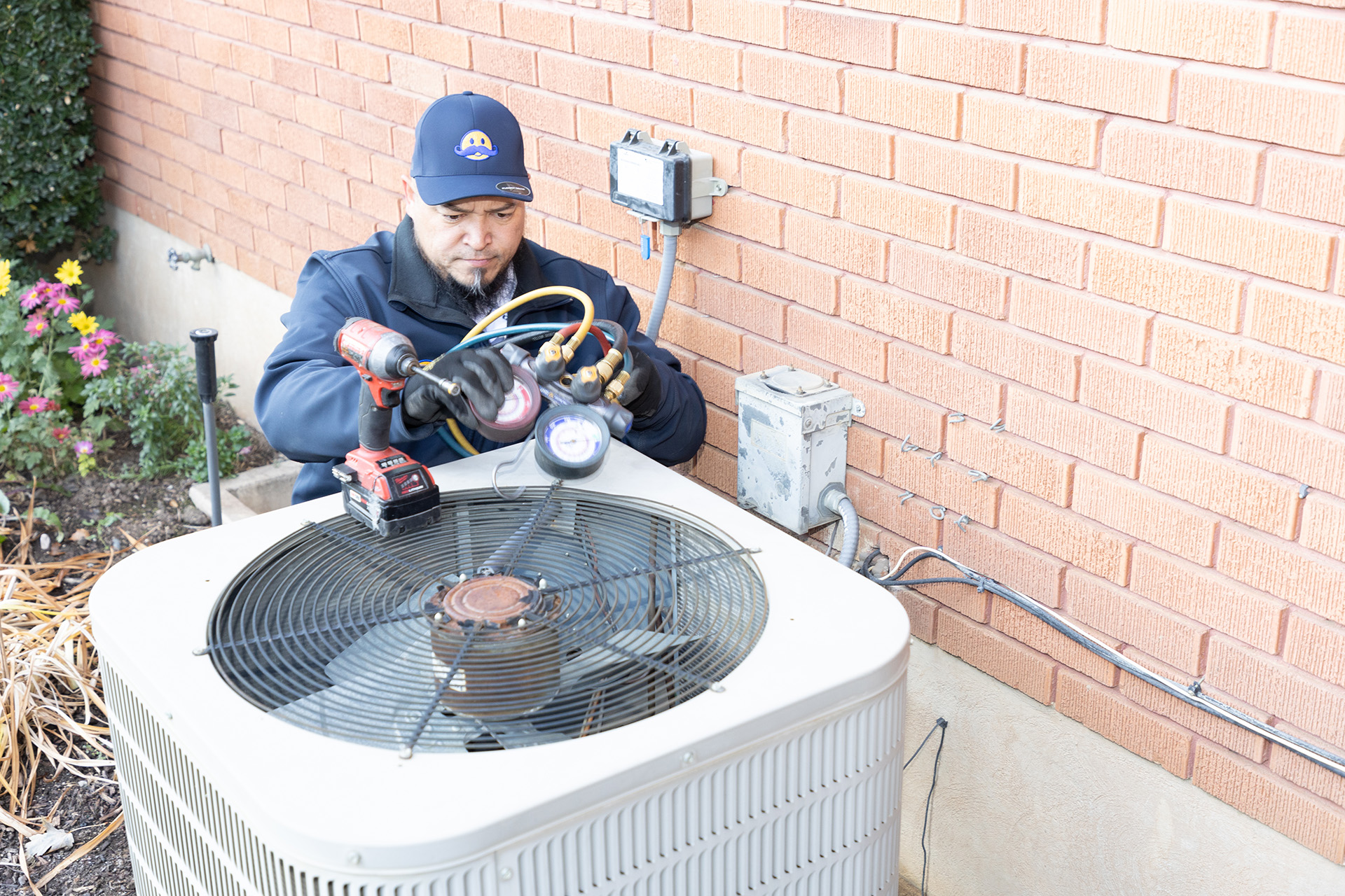 HVAC Install – Ogden, Utah – Absolute Comfort Absolute Comfort technician cleans during Ogden HVAC system install